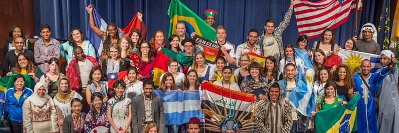 FLTA students holding flags of their countries