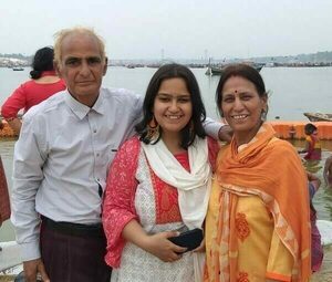 Amrita with her parents In Mahakumbh Mela, Prayagraj, India